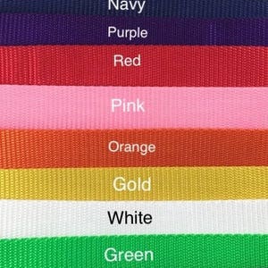 May include: A color chart showing 12 different colors of webbing. The colors are: black, brown, navy, purple, red, pink, orange, gold, white, green, forest green, and teal.