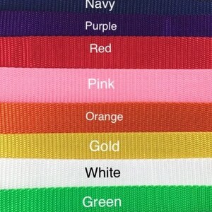 May include: A color chart showing 13 different colors of webbing. The colors are: black, brown, navy, purple, red, pink, orange, gold, white, green, forest green, and teal.