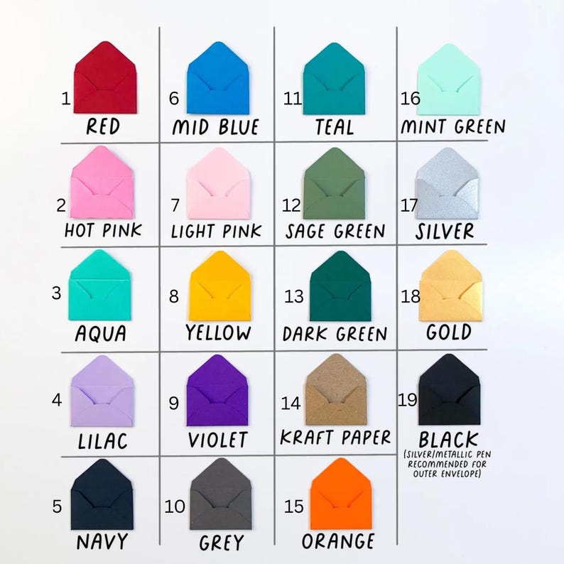 a group of different colored envelopes on a white background