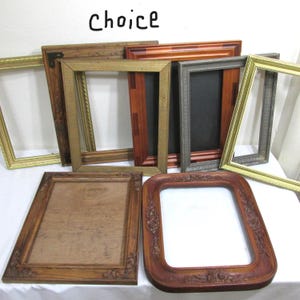 May include: A collection of various picture frames in different styles and colors. The frames include gold, brown, and gray tones, with some featuring ornate carvings. The word "Choice" is written in black script at the top.