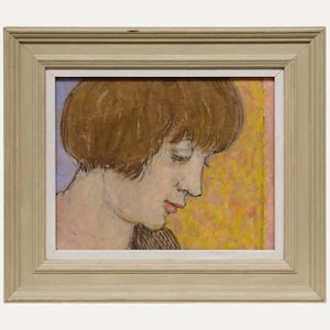 May include: An oil painting in a light-coloured wooden frame, depicting a woman with short brown hair in profile. Her eyes are closed, and her lips are a soft pink. The background features yellow, pink, and purple hues.