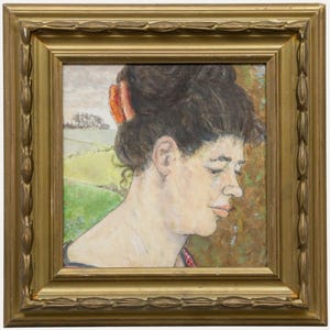 May include: A framed portrait of a woman in profile, with dark hair styled up and a red hair accessory. The painting features a landscape background with green fields and a cloudy sky. The frame is gold.