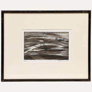 May include: A framed black and white abstract etching featuring layered curved lines and shaded textures. The print is matted in off-white and enclosed in a thin black frame. The bottom left corner shows 7/20 and the bottom right shows R.K.P. 75.