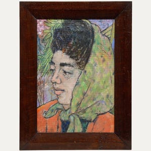 May include: An oil painting portrait of a person wearing a green headscarf and an orange jacket, set against a backdrop of foliage. The artwork is framed in a dark brown wooden frame, showcasing a vintage aesthetic.