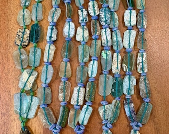 Ancient roman glass beads whole strand link style with 1 pendant