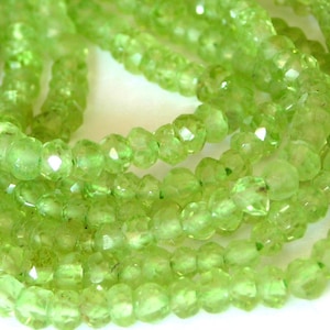 Peridot WHOLE STRAND teeny tiny faceted rondells 14 inch strand