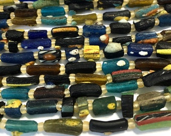 Multi colored Ancient roman dark glass beads whole strand random nugget style