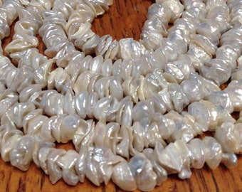 Pearls center drlled Keishi petals cream colored pearls half strand AAA grade