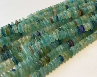 Ancient roman glass beads little rondelles saucers