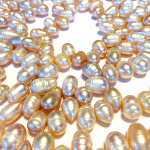 Dancing Pearls creamy mauve/peach color WHOLE strand