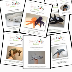 May include: A collection of sewing patterns for creating stuffed animals from upcycled denim. The patterns include a beluga whale, octopus, turtle, shark, and dolphin. Each pattern is labeled with the name of the animal and the designer's name.
