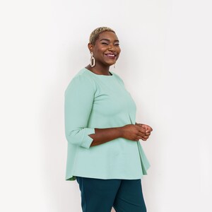 Fit & flare top: buttery soft cotton blend top with three-quarter sleeves and front pleat detail in sizes XS-XXXL choose from 50 colors image 5