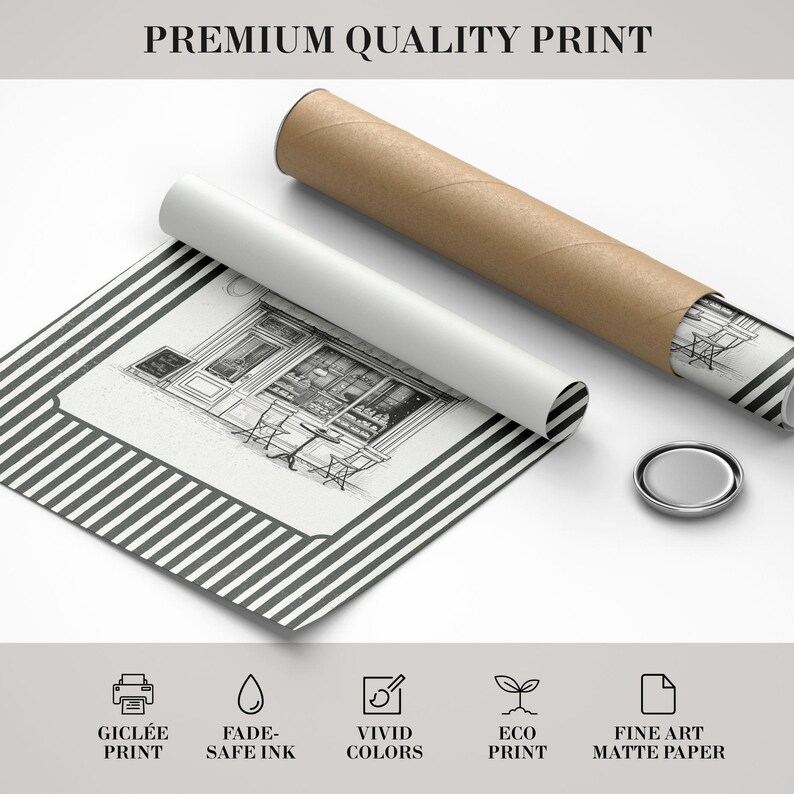 May include: A black and white print of a cafe scene, rolled up with a white and brown tube. The print is on matte paper and features the text "PREMIUM QUALITY PRINT". The print is accompanied by a silver metal object.