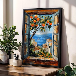 May include: A framed painting depicts a vibrant coastal scene viewed through an open window. The artwork showcases an orange tree laden with fruit, overlooking a blue sea and a village with white buildings. The painting is set in a black frame.