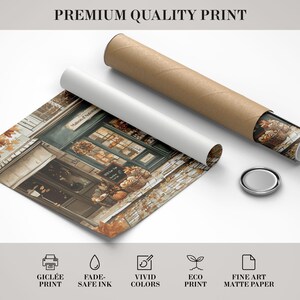 May include: Rolled print of a watercolor painting of a shop with the text "Maison d'Automne". The print is accompanied by a rolled-up brown tube, a white tube, and a silver cap. The print is labeled "Premium Quality Print".