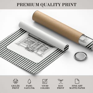May include: A black and white architectural print of a building with a striped border, rolled with a brown tube. The print is labeled "Premium Quality Print" and features icons for Gicl&eacute;e print, fade-safe ink, vivid colors, eco print, and fine art matte paper.