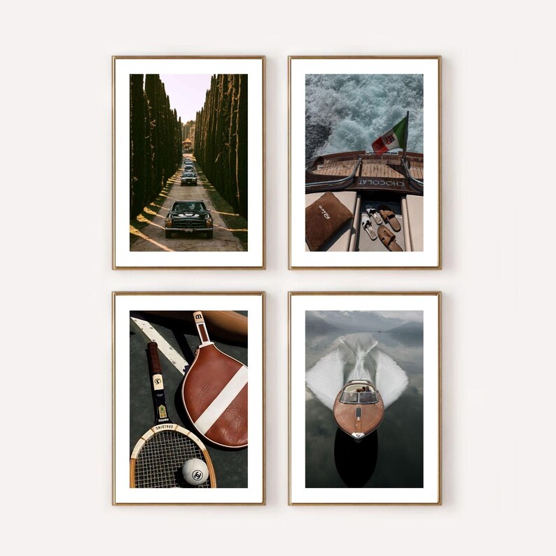 May include: Four framed art prints with gold frames. The images show a vintage car on a tree-lined road, a boat with an Italian flag, tennis equipment, and a speedboat on a lake.