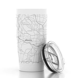 May include: White stainless steel travel mug with a black and white map of Atlanta, Georgia printed on the side. The mug has a clear lid with a black ring around the edge.