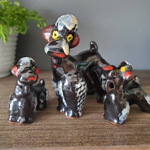 Black poodle figurines