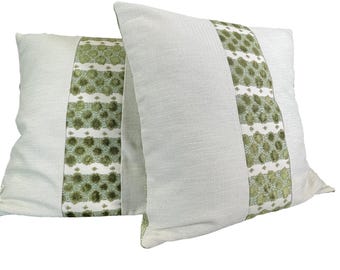 Juego de 2 fundas de almohada con centro de rayas verdes y estampado en zigzag en los laterales.