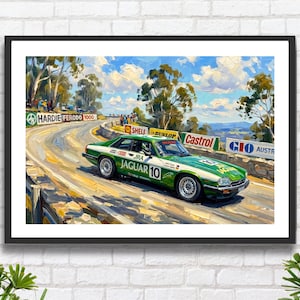 May include: An oil painting print of a green and white Jaguar race car with the number 10, driving on a winding track. The scene features sponsor signs for Hardie Ferodo 1000, Shell, Dunlop, Castrol, and GIO Australia under a bright blue sky.
