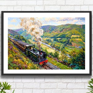 May include: A framed print of a vintage train traveling through a lush green valley. The train is dark green with a red front, billowing white smoke. The landscape features rolling hills, a river, and a bright blue sky.