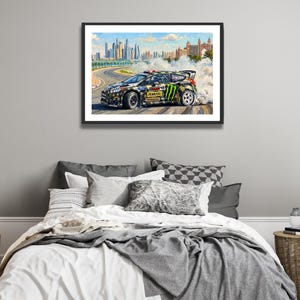 Ken Block Hoonigan Ford Fiesta ST RX43: Gymkhana 8 Dubai Impressionist Impasto Motorsport Print in a black frame hanging in a bedroom