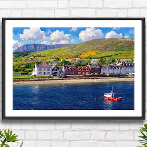 May include: A framed landscape painting depicts a coastal village with white and red buildings, a green hillside, and a blue sea. A small red and white boat floats on the water under a blue sky with fluffy white clouds. The artwork is displayed on a white brick wall.