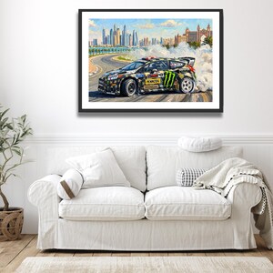 Ken Block Hoonigan Ford Fiesta ST RX43: Gymkhana 8 Dubai Impressionist Impasto Motorsport Print in a black frame hanging in a living room