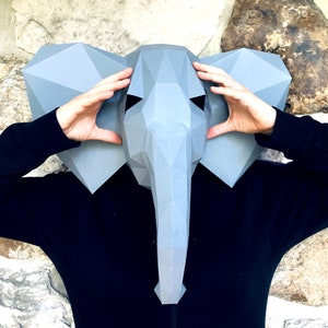 Elephant head mask 3d papercraft. get SVG, PDF digital file pattern and instruction for this DIY 3d papercraft low poly paper mask.