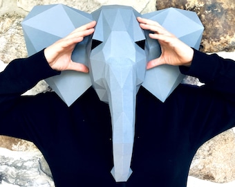 Elephant head mask 3d papercraft. get SVG, PDF digital file pattern and instruction for this DIY 3d papercraft low poly paper mask.