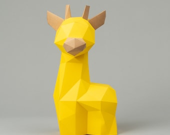 May include: A yellow papercraft giraffe with brown ears and a brown nose. The giraffe is made of folded paper and has a geometric design.