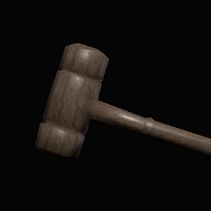May include: A wooden gavel with a dark brown finish, set against a black background. The gavel features a cylindrical handle and a rectangular head, commonly used in legal settings.