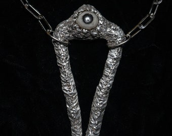 Large silver soldered eye pendant necklace