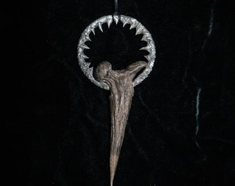 Sculpted bone pendant 6