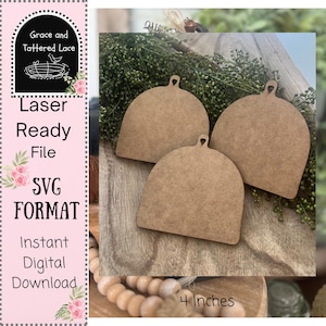 May include: Three unfinished wooden bell-shaped ornaments, each with a small loop at the top. The ornaments are approximately 4 inches in height. The image also includes text that reads "Laser Ready File SVG Format Instant Digital Download."