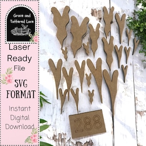 May include: A collection of laser-cut wooden shapes, including heart and abstract designs, arranged on a white wooden surface. The number "288" is etched on a small rectangular piece. The image also includes text that reads "Grace and Tattered Lace", "Laser Ready File", "SVG FORMAT", and "Instant Digital Download".