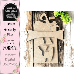 May include: A laser-ready SVG file of a wooden pumpkin decoration. The pumpkin has a banner for customization, a bird, and a jack-o'-lantern face. The image also includes the text "Laser Ready File SVG FORMAT Instant Digital Download."