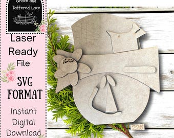 May include: A laser-ready SVG file featuring a layered bird design with a flower and sailboat. The image includes the text "Grace and Tattered Lace", "Laser Ready File", "SVG Format", and "Instant Digital Download". The design is light brown and set against a white wood background.
