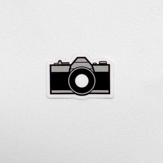Camera Mini-Sticker with See-Through Lens