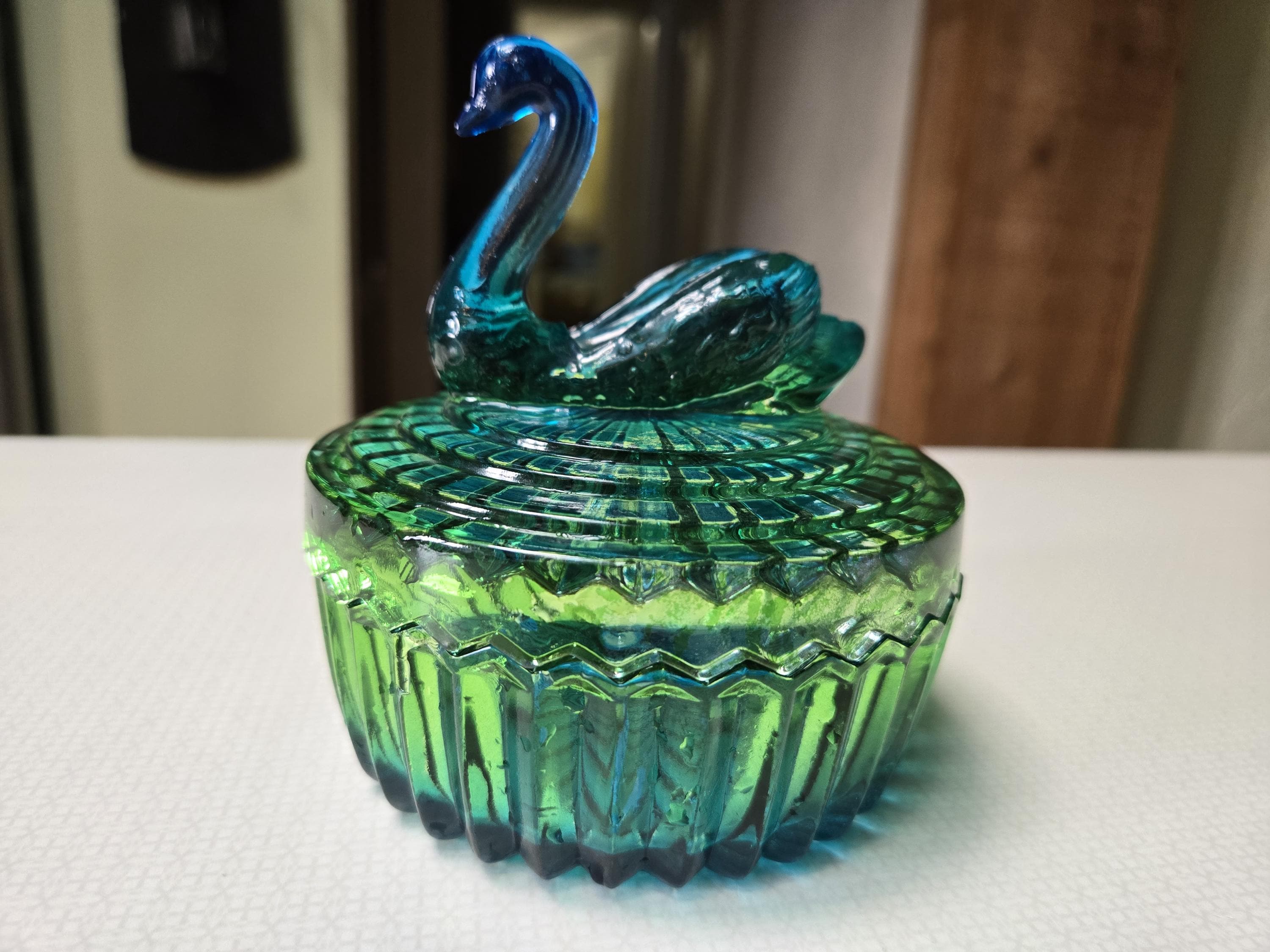 This is a Vintage Jeanette Swan Glass Blue and Green Trinket Dish