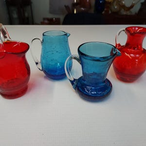 Set Of 4 Blenko & pilgrim crackle glass pitchers and basket