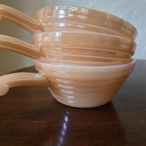 Stacking set of 3 Anchor Hocking Fire King peach luster beehive soup bowls. All are in mint shape. Perfect for any collector
