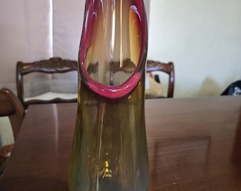 Beautiful Hand blown swung art glass vase by John Mack glass maker from Michigan. Made in 1950s. The colors on this piece Orange,yellows!