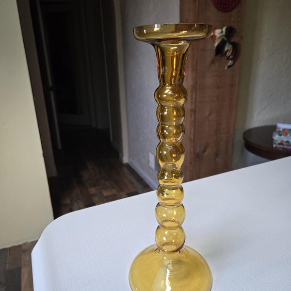 RARE Vintage MCM Hand blown amber color glass candle holder measuring 13" tall. What a beauty