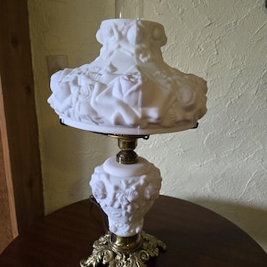 Vintage Fenton/L G Wight puffy rose white over cranberry turn key GWTW lamp in mint shape! stands 22&quot; tall x 12&quot; wide. This lamp is heavy!
