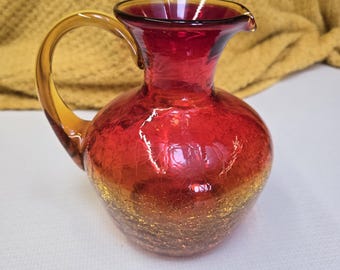 Piękny dzbanek MCM amberina crackle z kadmu o grubym dnie, o wymiarach 7&quot; wysokości x 7&quot; szerokości. To ciężki egzemplarz. Spójrz tylko na te kolorowe