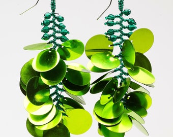 Long dangling statement earrings made with large lime green sequin paillettes and glass seed beads