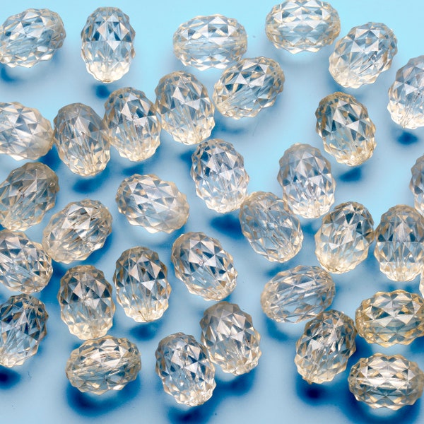 Big clear Lucite beads large lot of 40 textured oval shaped pieces about 25mm x 18mm