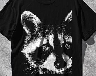 Hypnotic Raccoon T-Shirt Trippy Black and White Psychedelic Animal Graphic Tee with Spiral Eyes Vintage Style Raccoon Shirt for Meme Fans